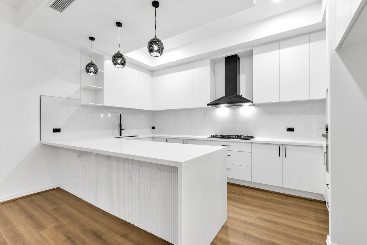 Kitchen and island bench – 13 Tussock Way, Officer