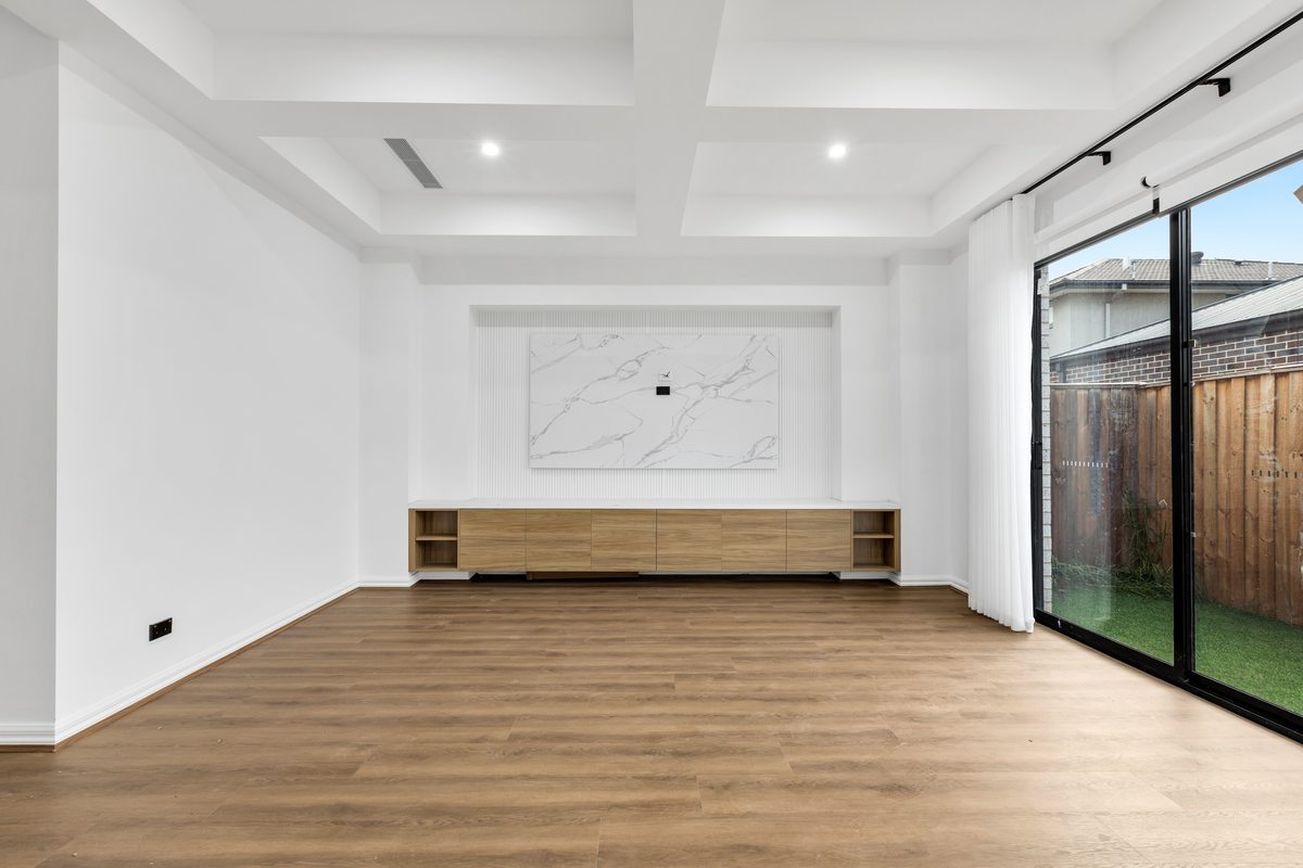 Living area with sliding doors – 13 Tussock Way, Officer